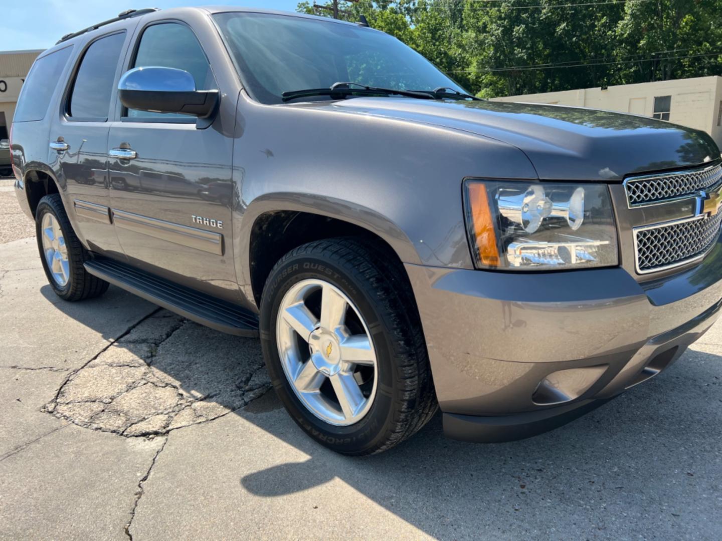 2014 Brown /Tan Chevrolet Tahoe LS (1GNSCAE04ER) with an 5.3L V8 engine, Automatic transmission, located at 4520 Airline Hwy, Baton Rouge, LA, 70805, (225) 357-1497, 30.509325, -91.145432 - 2014 Chevy Tahoe LS 5.3 V8 Gas, 147K Miles, 8 Passenger Seating, Backup Camera, Power Windows, Locks & Mirrors, Cold A/C, Tow Pkg. FOR INFO PLEASE CONTACT JEFF AT 225 357-1497 CHECK OUT OUR A+ RATING WITH THE BETTER BUSINESS BUREAU WE HAVE BEEN A FAMILY OWNED AND OPERATED BUSINESS AT THE SAME LOCA - Photo#3